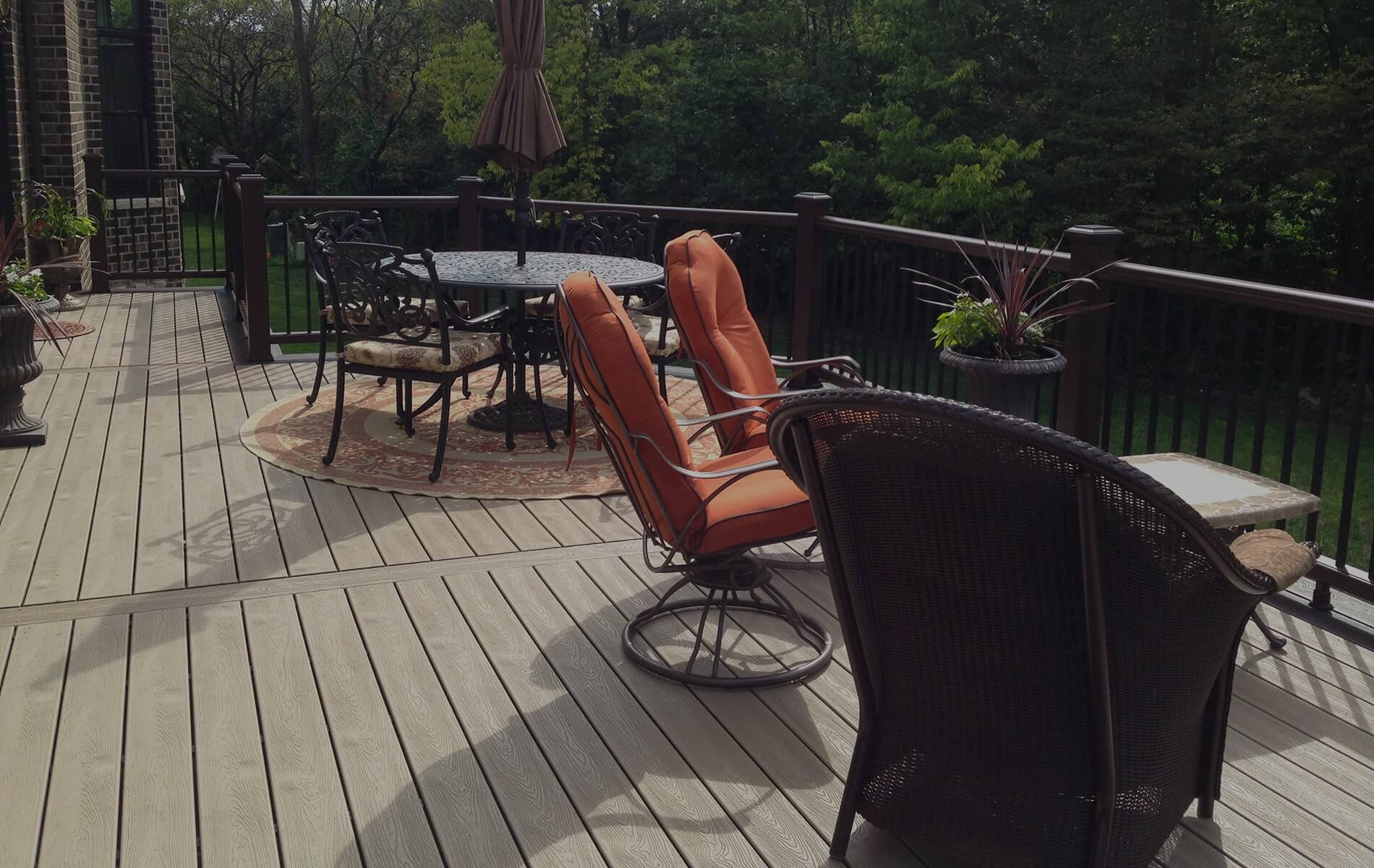 composite deck installation with a black railing