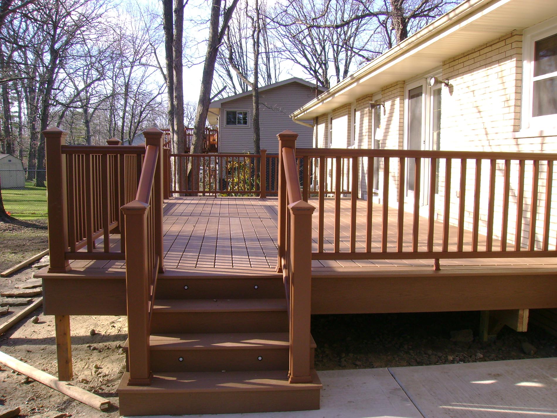 raised deck with stairs and lighting
