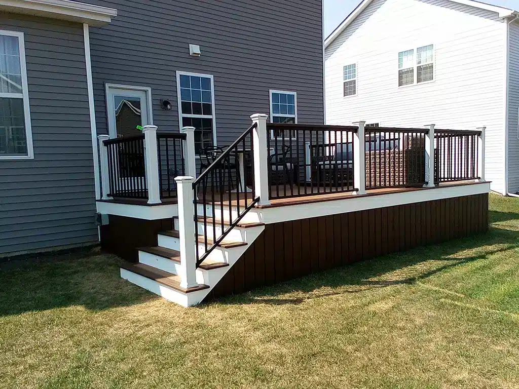 photo of elevated deck with railing and steps - deck contractors near me in naperville il