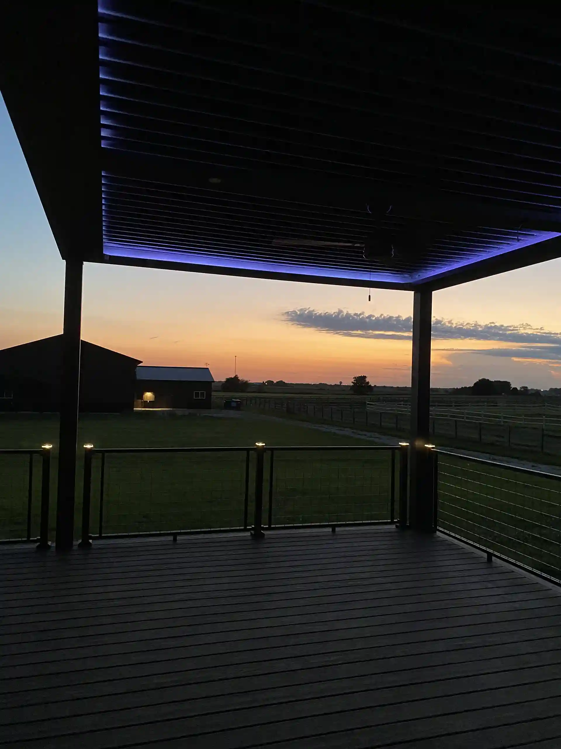 elevated deck with motorized louvered pergola in lemont, il