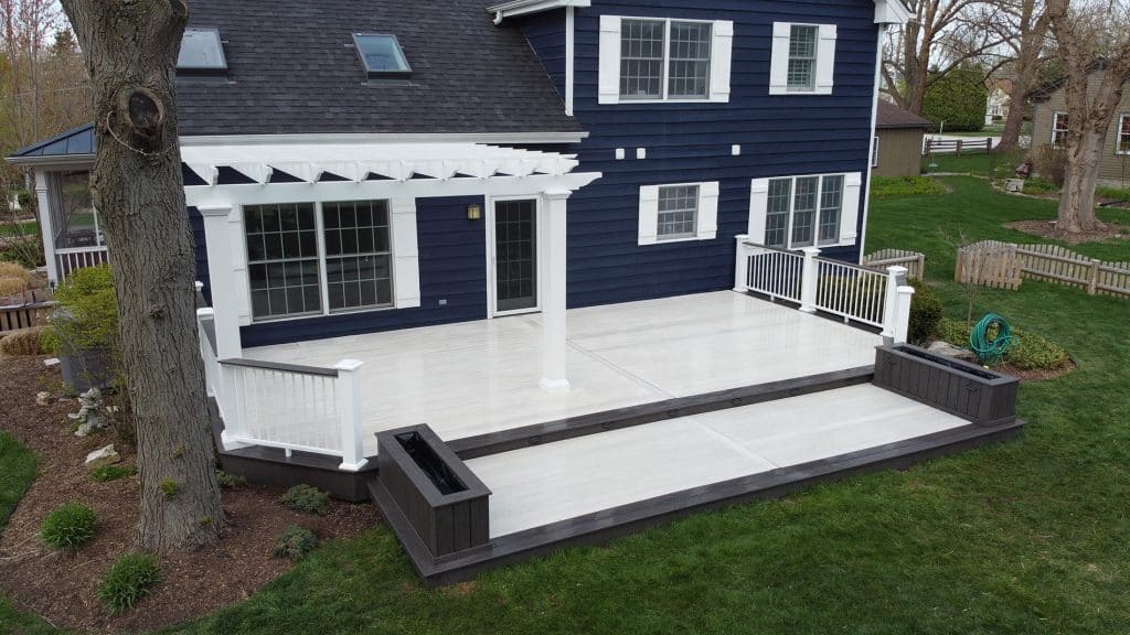 multi-level deck with pergola and planter boxes