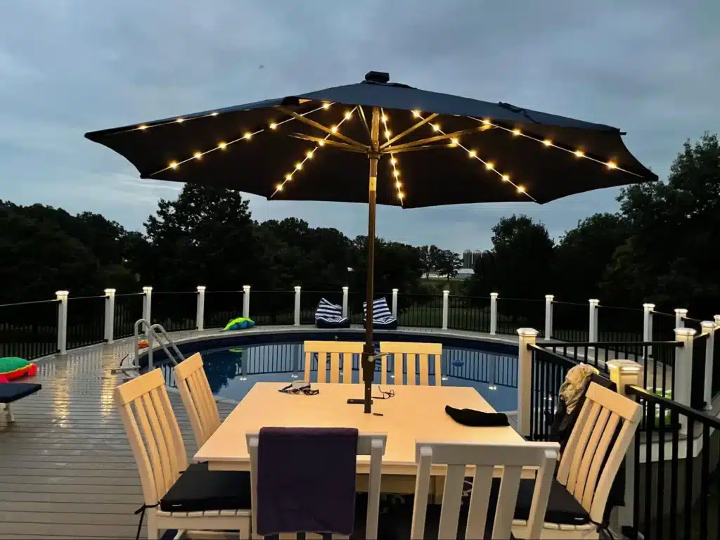 outdoor living space for dining with deck lighting