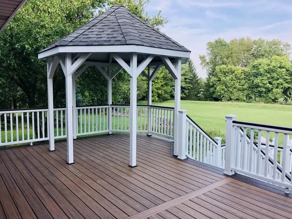 pergola in deck with white railings - chicago deck builders il