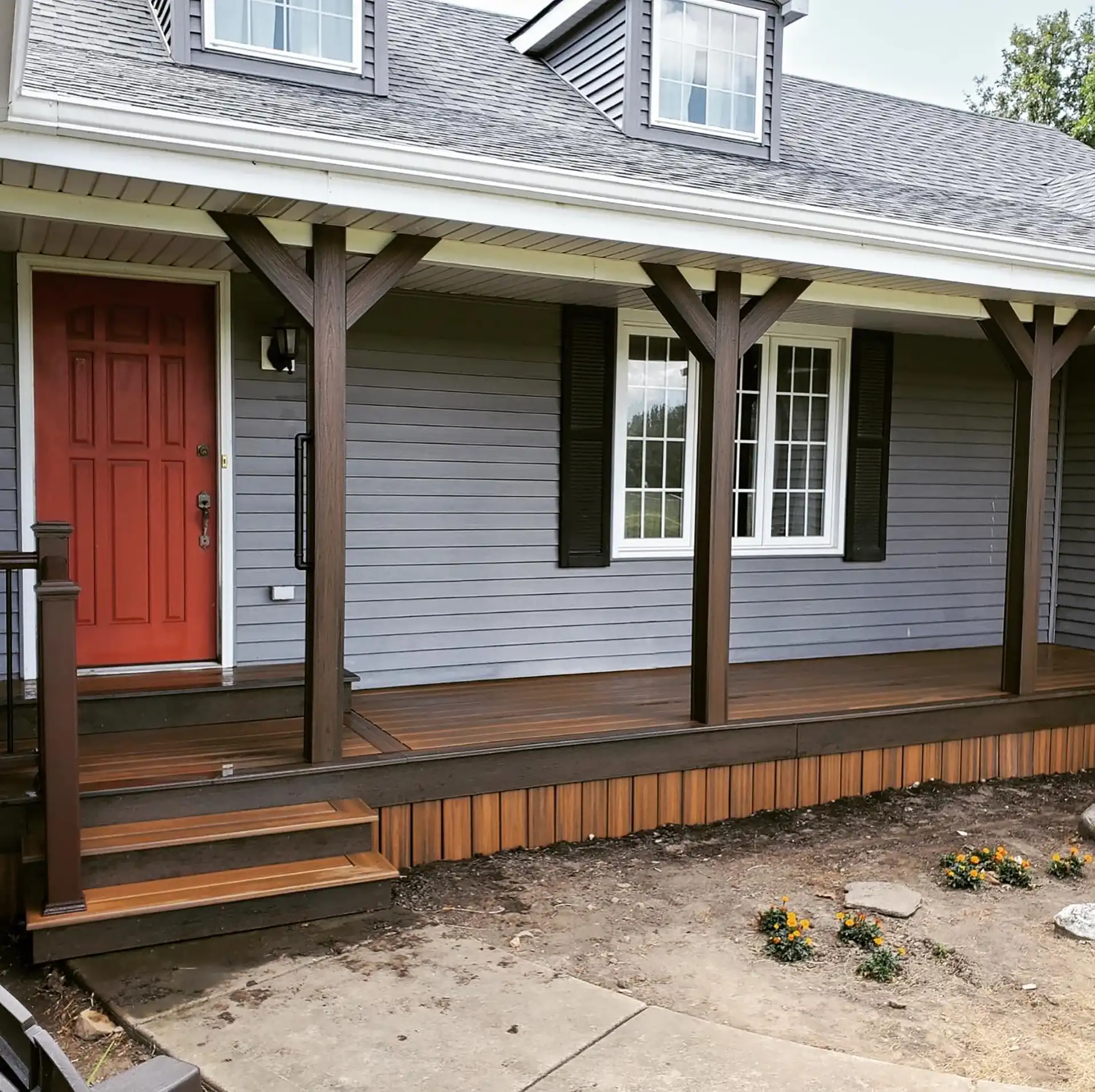 photo of a covered porch with beams - porch builders in chicago suburbs