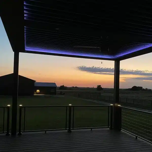 photo of a sunset from underneath a struxure louvered pergola