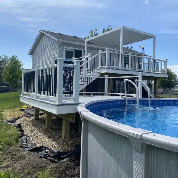 photo of a multi-level pool deck with a pergola.