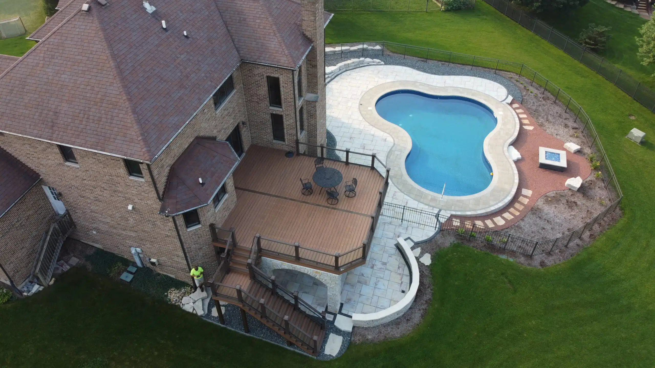 6 above-ground pool deck ideas paver patio with pool scaled e1682100149767